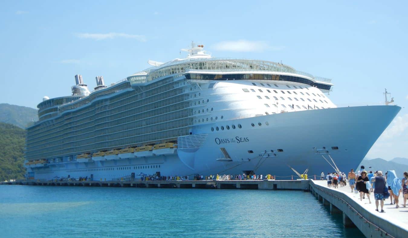 a huge cruise ship at a dock