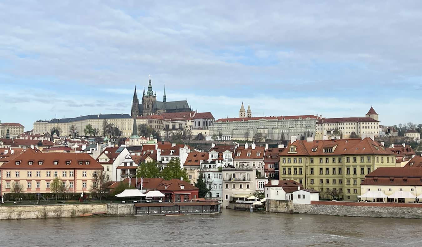 A sunny day with a blue sky over the historic Old Town of Prague in Czechia