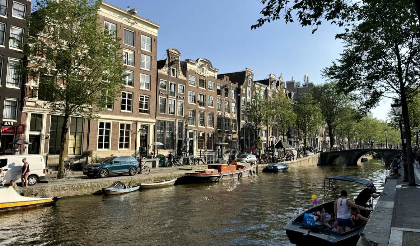 Walking around the historic canals of sunny Amsterdam, Netherlands
